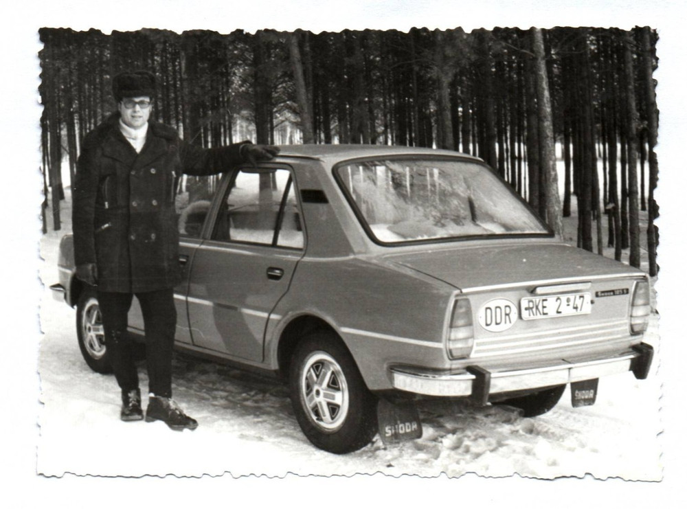 Photo GDR man at car Skoda 120 automobile motor vehicle vintage