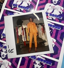 Polaroid Photo of hot model in orange channel jumpsuit London 1983 fashion is