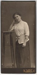 Photograph Ch. Eppler, Dresden, young woman in bright blouse with support ar