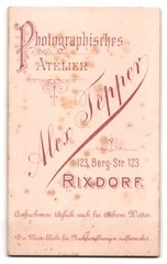 Photograph Alex Tepper, Rixdorf, Berg-Str. 123, lady in dark dress with silver