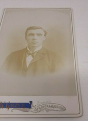 Antique Cabinet Card Photograph- Nicely dressed man in a suit taking a headshot