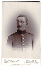Photograph Rud. Conrad, Berlin, Königstraße 34-36, Soldier in Uniform with Back