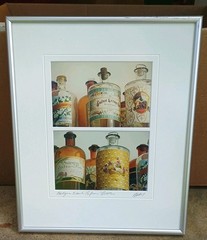 MADELINE GRAY Signed 2 Photographs Perfume bottles Matted Silver Framed 13×10.5″