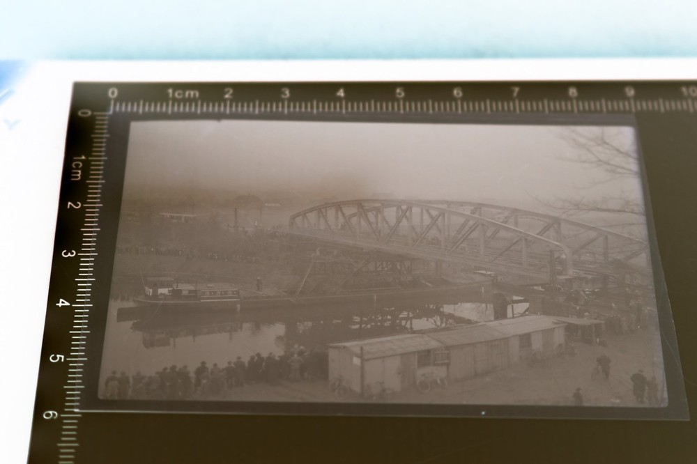 Great old negative – unknown bridge with inland freighter?? place ?