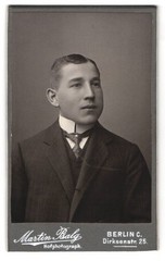 Photograph Martin Balg, Berlin, Dirksenstr. 25, teenager in suit and krawa