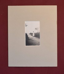 Vintage Photograph of a Woman Standing on a Road, in a Grey Matte Frame