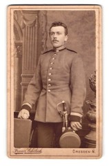 Photograph Franz Ehrlich, Dresden, Königsbrücker-Straße 50, Uffz. with saber and