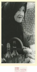 Old Czech woman w bottles vintage photo K. Kucera