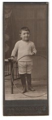 Photograph Hermann Tietz, Hamburg, large burstah, child with tires