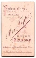 Photograph Alex Tepper, Rixdorf, Berg-Str. 123, woman in fitted black K