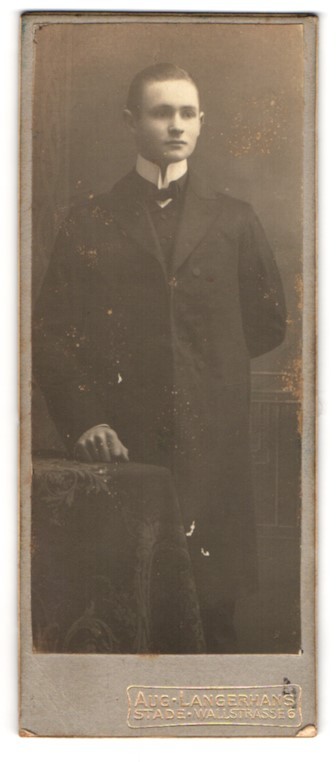 Photograph Aug Langerhans, Stade, Wallstr. 6, young man in long coat