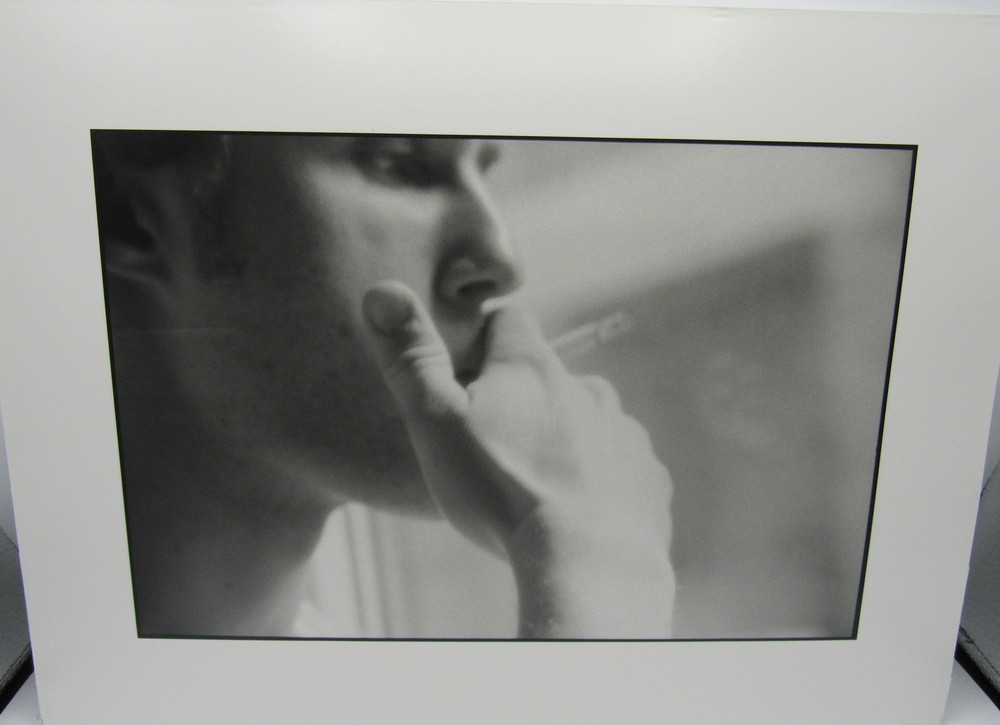 Photograph of a man smoking 13×17″