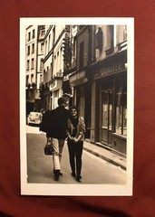 J.W. Howlett Black + White Photograph Focusing on a Man + Woman in an Urban Area
