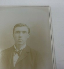 Antique Cabinet Card Photograph- Nicely dressed man in a suit taking a headshot