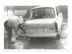 Photo icon Trabant 601 S cult vehicle GDR vintage car man washing car