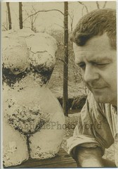 Man by female figure sculpture vintage art photo