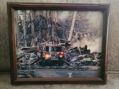 Framed picture, Sept. 11th fireman in rubble size 9″×11″