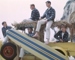 The Beach Boys Iconic 1960’s pose with surfboards in yellow jeep 16×20 Poster
