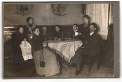 Photography inn – company with zither / musical instrument at regulars’ table s