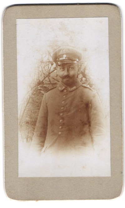 Photograph Uffz. in uniform field grey with moustache in forest