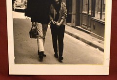 J.W. Howlett Black + White Photograph Focusing on a Man + Woman in an Urban Area