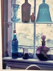 “Sunlit Memories in Colored Glass Bottles” Framed Photograph 21.5” X 25.5”