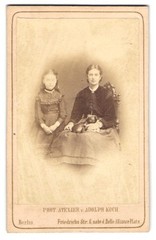 Photograph Adolph Koch, Berlin, mother with her daughter and dog on her lap