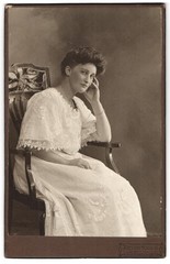 Photograph person, Lahr/Baden, lady in thoughtful pose on chair in lace