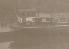 Great old negative – unknown bridge with inland freighter?? place ?