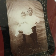 Vintage Old Handmade ?photo in glass with chain wrapped around 9”x9”