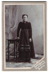 Photograph Eduard Bertel, Salzburg, portrait of a girl with table