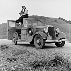 Dorothea Lange atop automobile in California 12×12 Photo 12″x12″