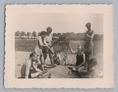 Buried Man with Small Shoes – Swimming Casual Fun Humour Photo