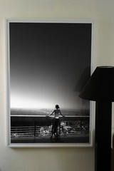 This black and white fine art print of a woman gazing at the Los Angeles