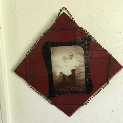 Vintage Old Handmade ?photo in glass with chain wrapped around 9”x9”