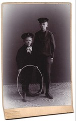 Photograph Wertheim, Berlin, Leipzigerstraße, 2 boys in uniform with tires