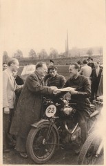 Photo postcard men on motorcycle vintage race reporter H. Skorka Menden-4-X