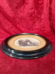 D-200. Antique Photograph Couple. Black Oval Frame. 19th Century