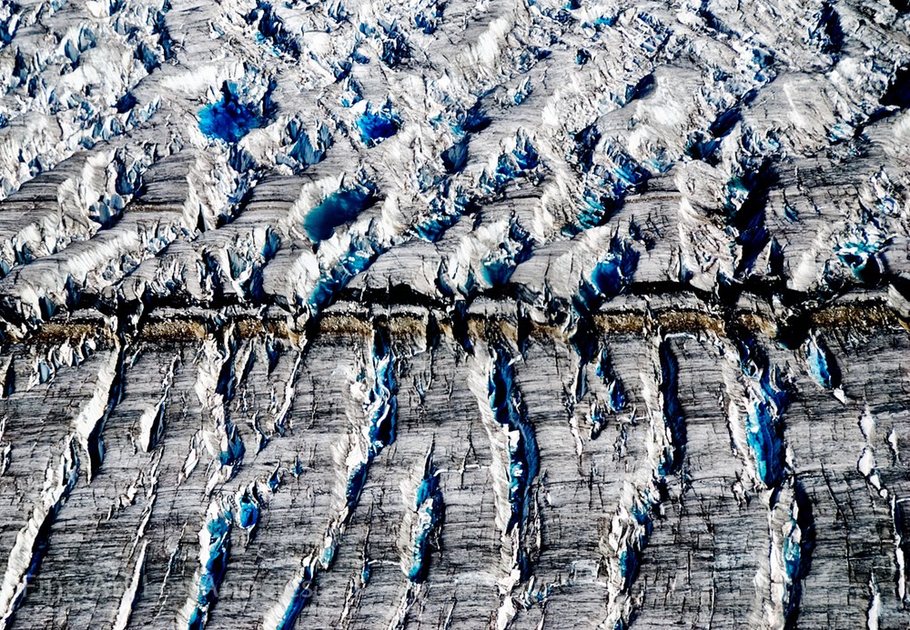 Neil Reichline Photo, «Ice Melt on Alaskan Glacier» aerial