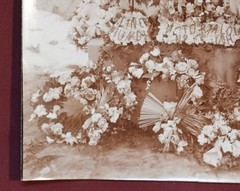 Antique Photograph Depicting a Woman’s Memorial with a Floral Arrangement