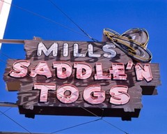 8×10 Vintage photo of the Mill’s Saddle’N Togs Neon Sign. Ellensburg, WA