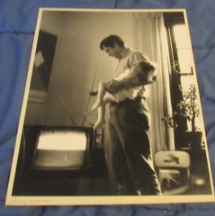 1977 Sandy Underwood photograph; man holding child, 11″ x 14″