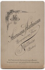 Photography Hermann Hartmann, Müllheim/Baden, lady with curls in dress with gemu