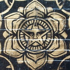 Street Art Gold on Black Brick NYC, Litho Print on Board, Photograph 18″ x 24″