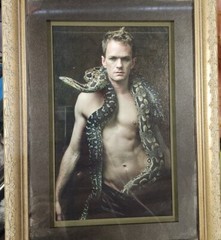 Neil Patrick Harris with a Dumeril’s boa and a diamond python portrait