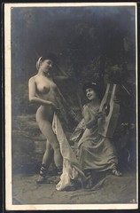 Photograph nude naked dancer accompanied by musician with stringed instrument