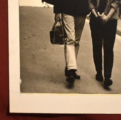 J.W. Howlett Black + White Photograph Focusing on a Man + Woman in an Urban Area