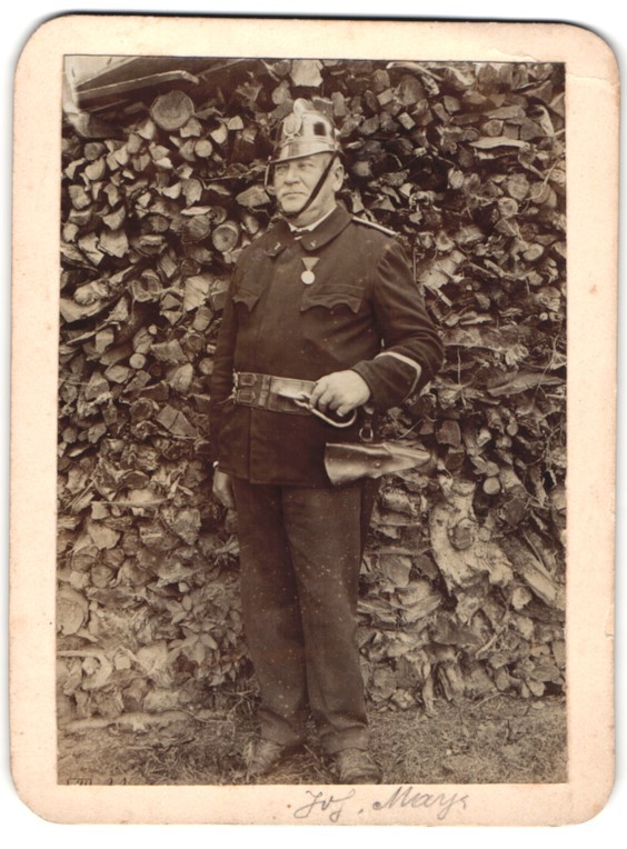 Photograph Karl Mayr, K.u.K. Fireman Joh. Mayr in uniform with helmet and Ka