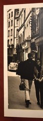 J.W. Howlett Black + White Photograph Focusing on a Man + Woman in an Urban Area