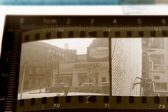 zwei tolle alte Negative – Geschäft Heisinger , Werbung Photo Leistenschneider